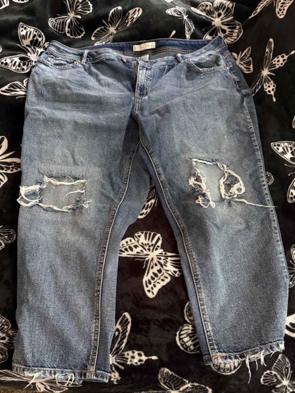 Woman’s Distressed Denim Jeans